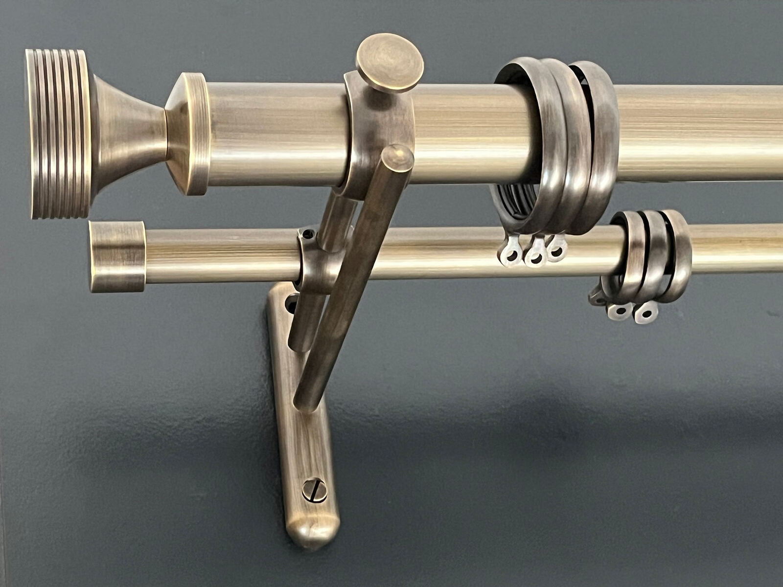 Double metal curtain Poles pictured with double bracket and metal rings